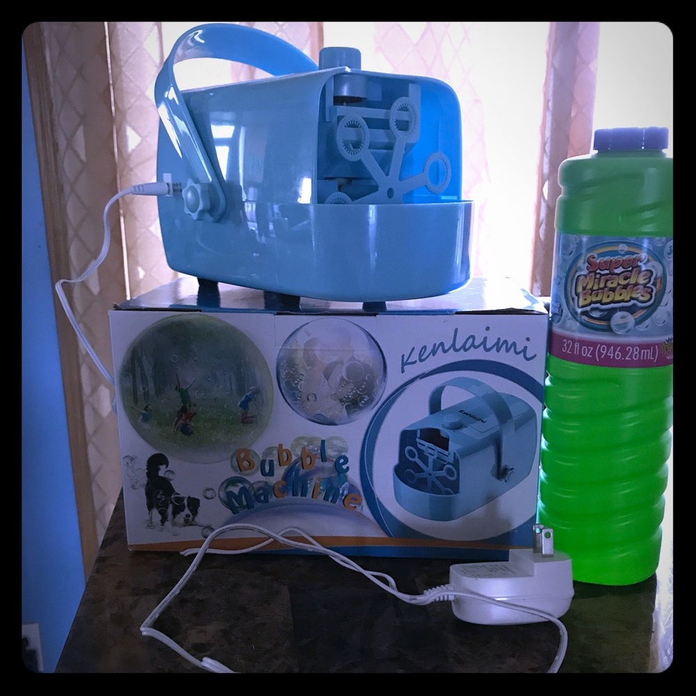 Bubble Machine! Large bottle of bubbles included!